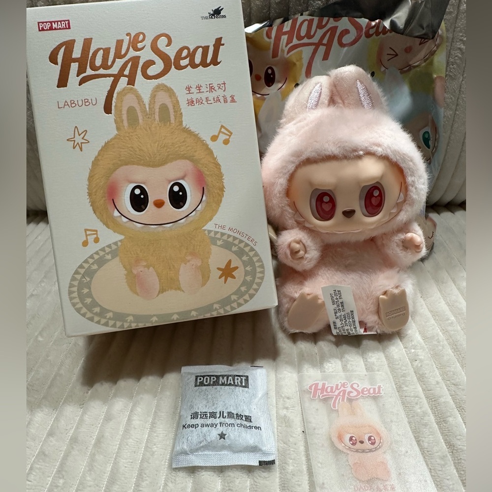 DADA- Pop Mart Labubu Have a Seat Figure - New. Box and bag opened to verify.